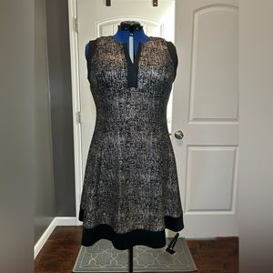 233 Roz & Ali Glitter Gold Patterned Sleeveless Mini with Black Trim Size 12P